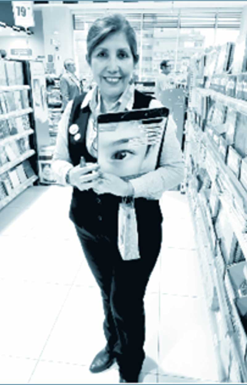 SOS Children's Villages Peru — Woman holding advert